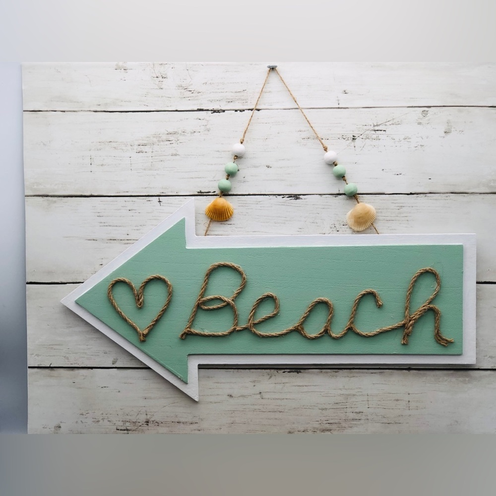 Handcrafted beach arrow wall sign